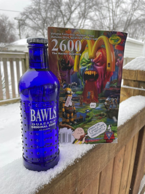 A blue bottle of Bawls and a 2600 magazine in the snow. This picture is the only part of this entry that isn’t AI-generated 